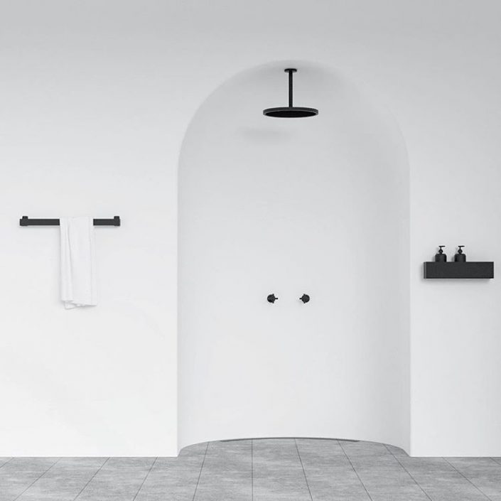 Une salle d'eau minimaliste avec quelques rondeurs