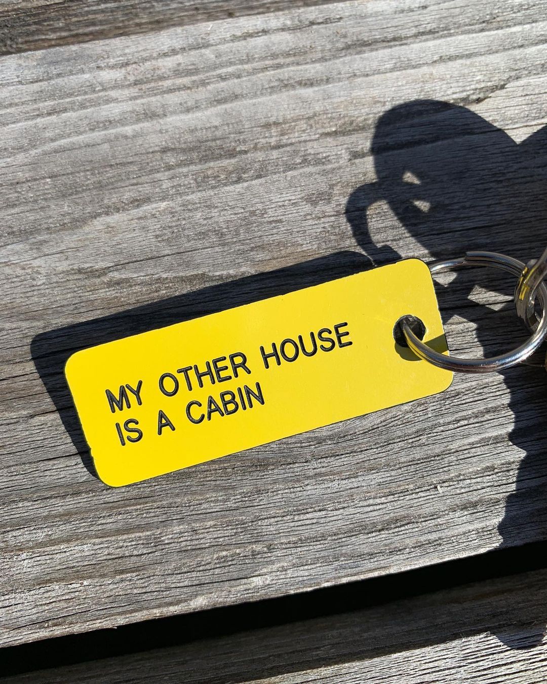 clé cabane DEN jaune My other house is a cabin